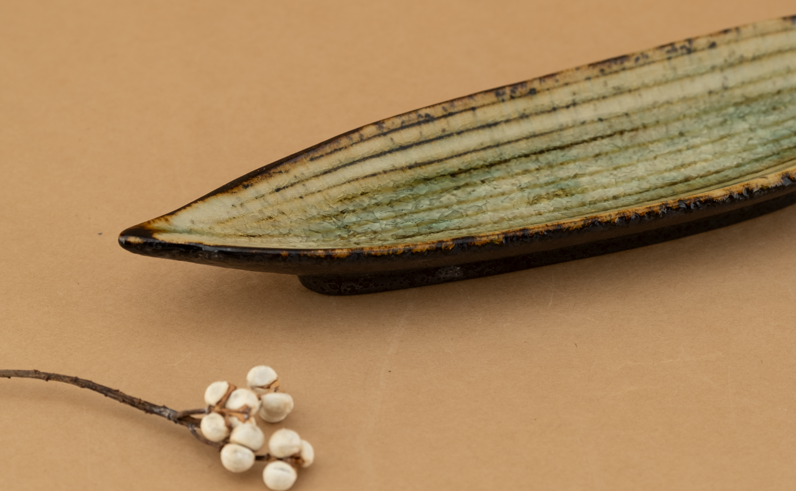 Lemon Moss ribbed rectangular tray with olive glaze pooling to moss green in the grooves