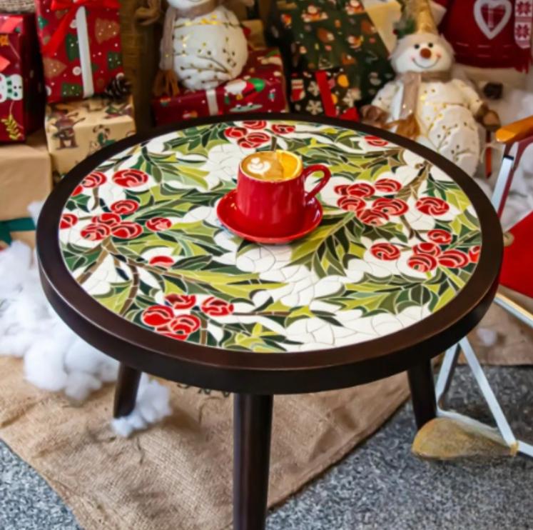 Café table with a ceramic mosaic top on a wood frame